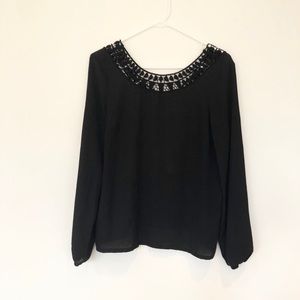 Black top with crocheted detail!